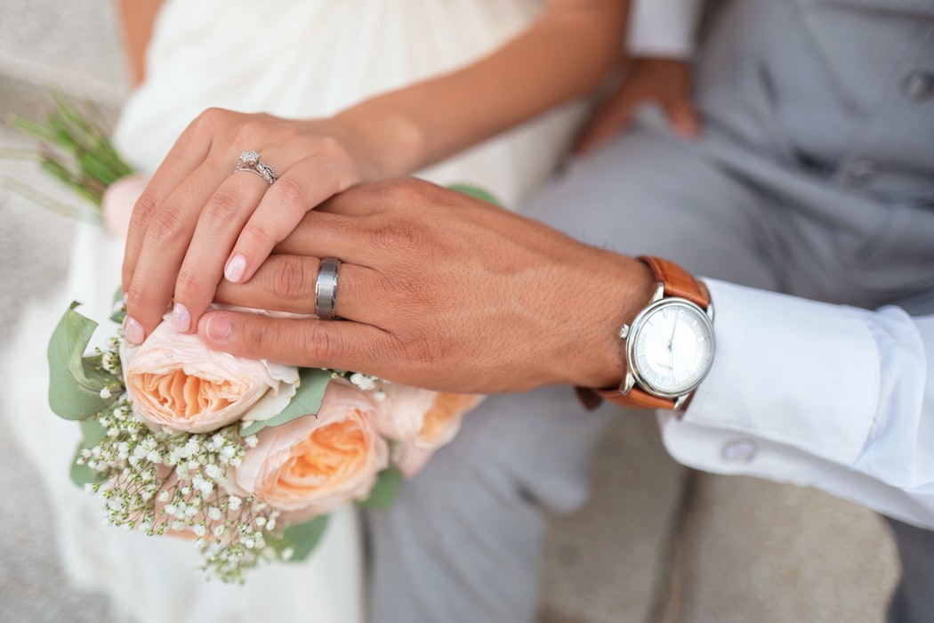 Bride And Groom Joining Hands