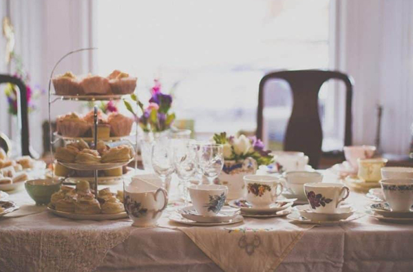 Thrift Store Wedding Decor - Mismatched Teacups On Table With Cupcake Tree